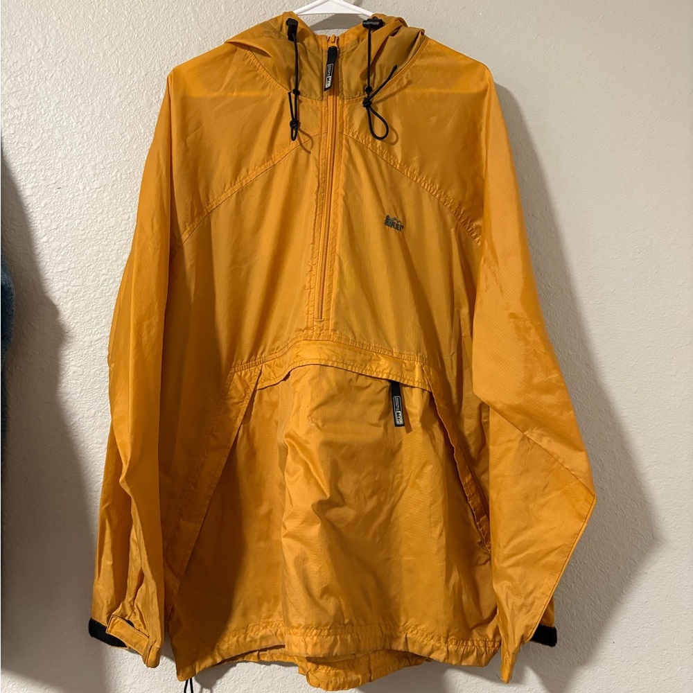 REI yellow windbreaker anorak with hood